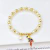 Hot Selling Pearl Chain Violin Round Heart-Shaped Venezuela Flag Stretch Bracelet: Luxury for Women Party Patriotic Jewelry Gift