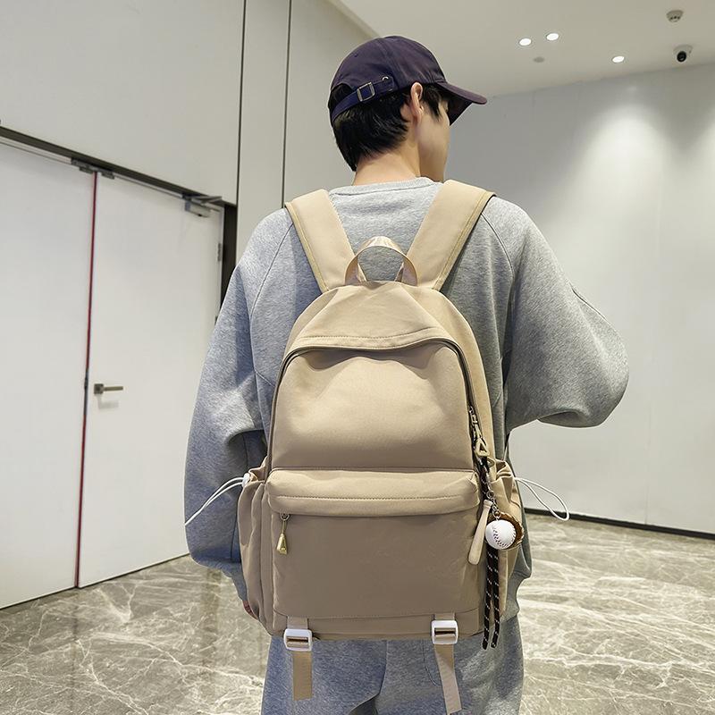 Schoolbag1011 new versatile black schoolbag male college student large capacity backpack female junior high school girl solid color backpack