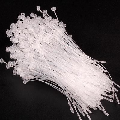 Bottone a pressione in plastica infilato a mano Laccio trasparente per etichetta abbigliamento