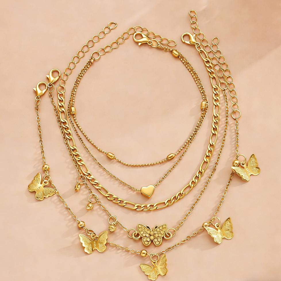 4-piece Gold Butterfly Multi-layer Anklet Set, Creative Beaded Heart Chain Anklet, Suitable for Vacation and Beach Wear.