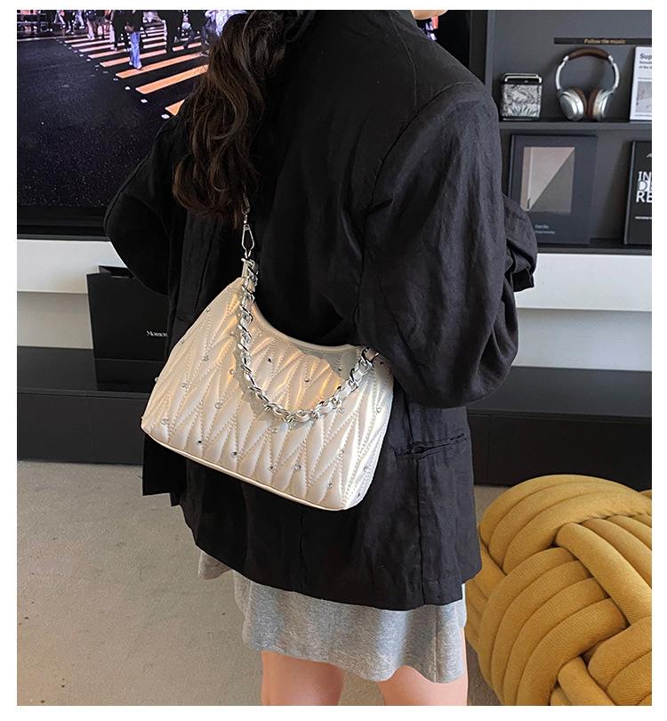 Geantă premium pentru femei 2025 nouă la modă geantă de umăr cu textură rombică geantă de navetă de mare capacitate geantă cu lanț