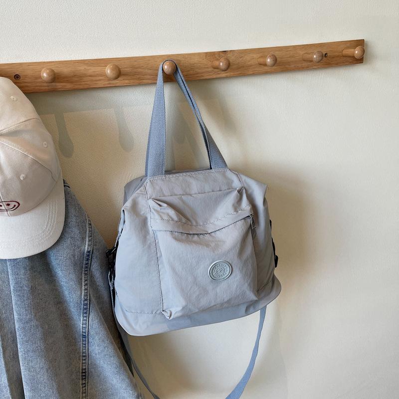 

2025 spring and summer new casual women s shoulder bag niche design pure foreign trend women s bag portable tote bag сірий колір