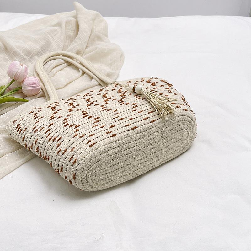 2025 summer new temperament literary large-capacity woven bag multi-functional foreign style portable underarm beach bag