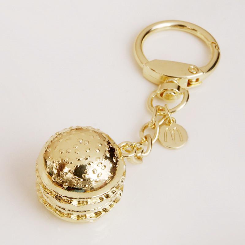 Hot Air Balloon & Hamburger Golden Keychain with Melon Seed Alloy and Sand Gold Ingot
