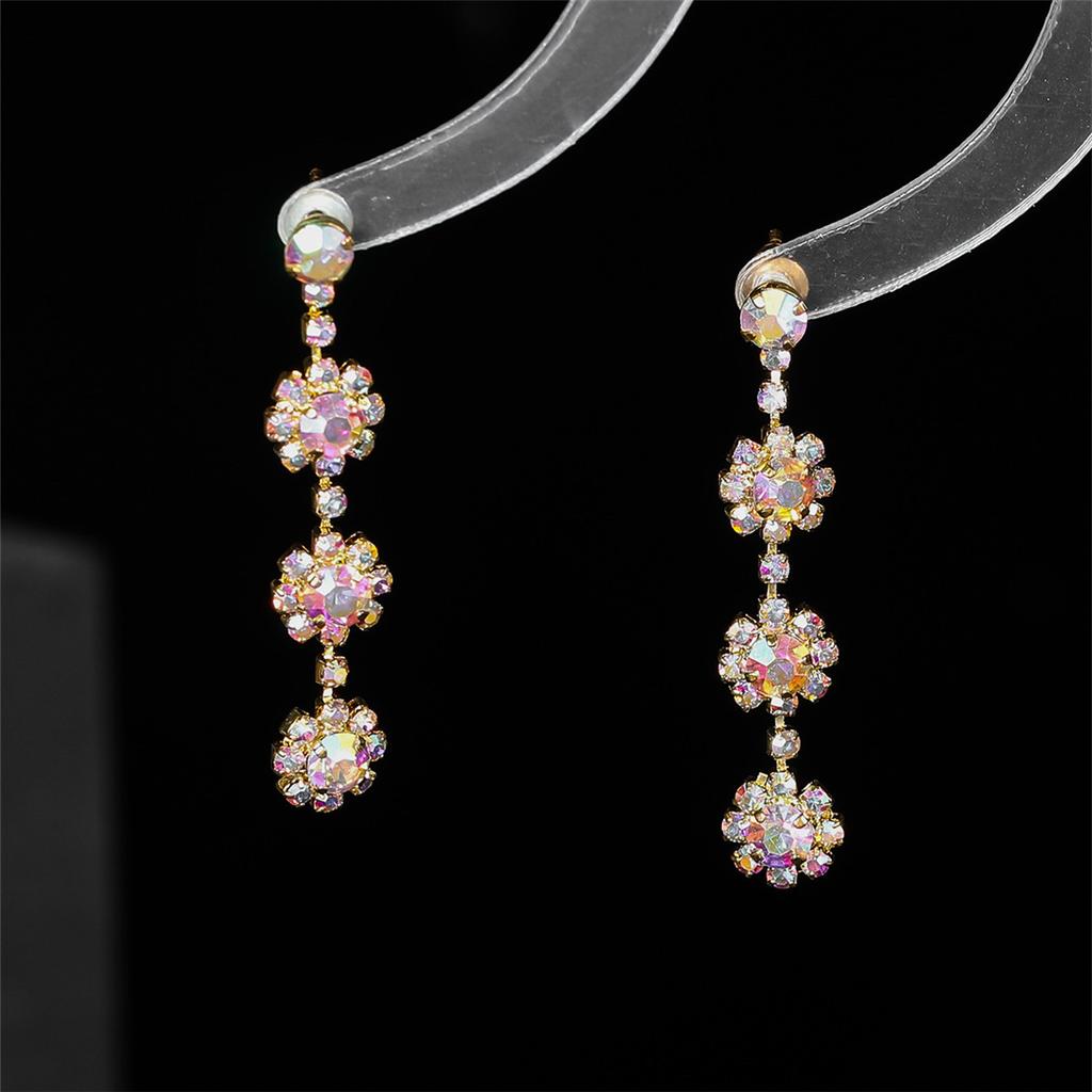 Enkle og allsidige geometriske AB rhinestone øredobber nisjedesign snøfnuggformede øredobber dameøredobber 1 par