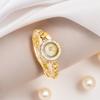 Montre pour femme Rétro Exquise Luxe Dorée Niche Haut de Gamme Cadran Fritillaire Montre à Quartz pour Femme