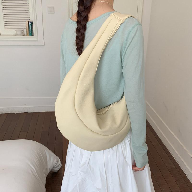 

Niche minimalist lightweight dumpling bag for women2026New large-capacity casual versatile shoulder bag жовтий