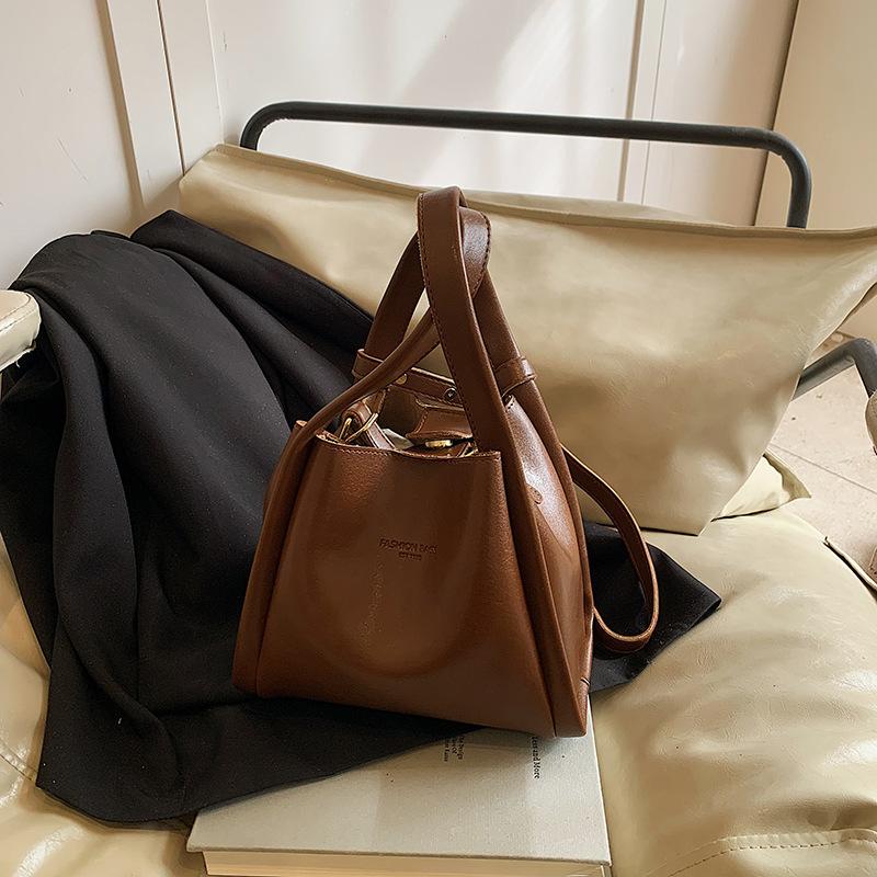 

Сумка маленького размера премиум-текстуры женская весна-лето 2025 новая универсальная нишевая женская повседневная сумка-мессенджер портативная сумка-ведро коричневый