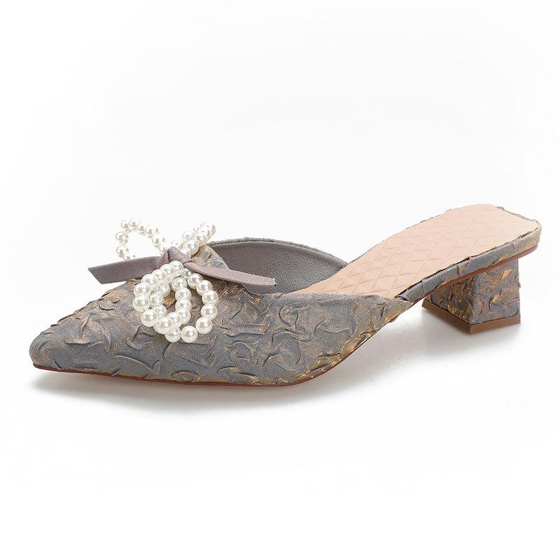 Baotou bär halvtofflor, damsommar 2025 nya damskor är populära i år, spetsig mellanhäl tjock häl svala tofflor