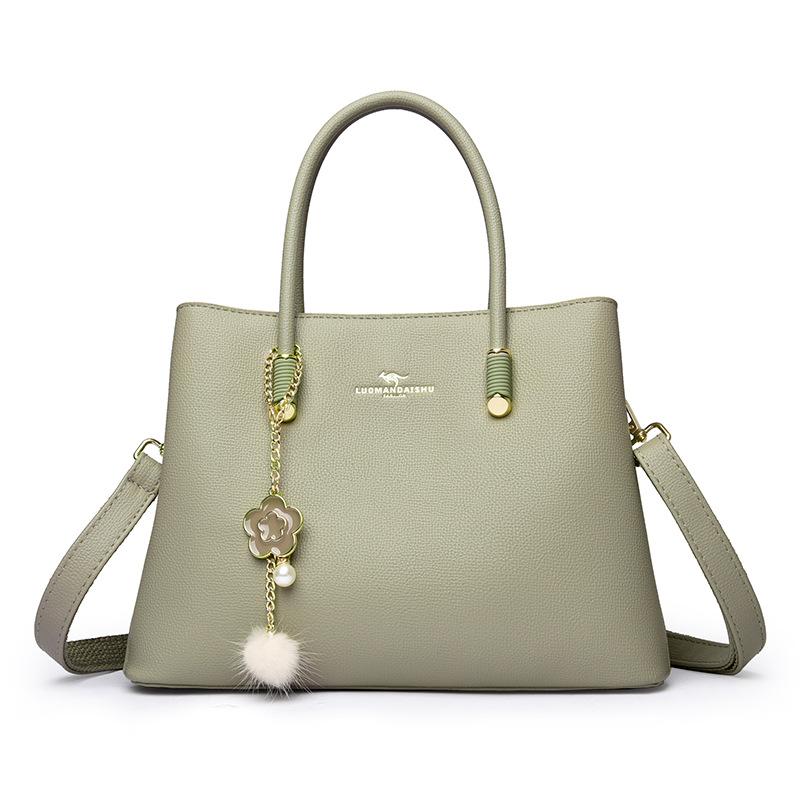 

Эта одноплечевая сумка кроссбоди большой вместимости — универсальная, элегантная и модная дамская сумочка. серый/зелёный