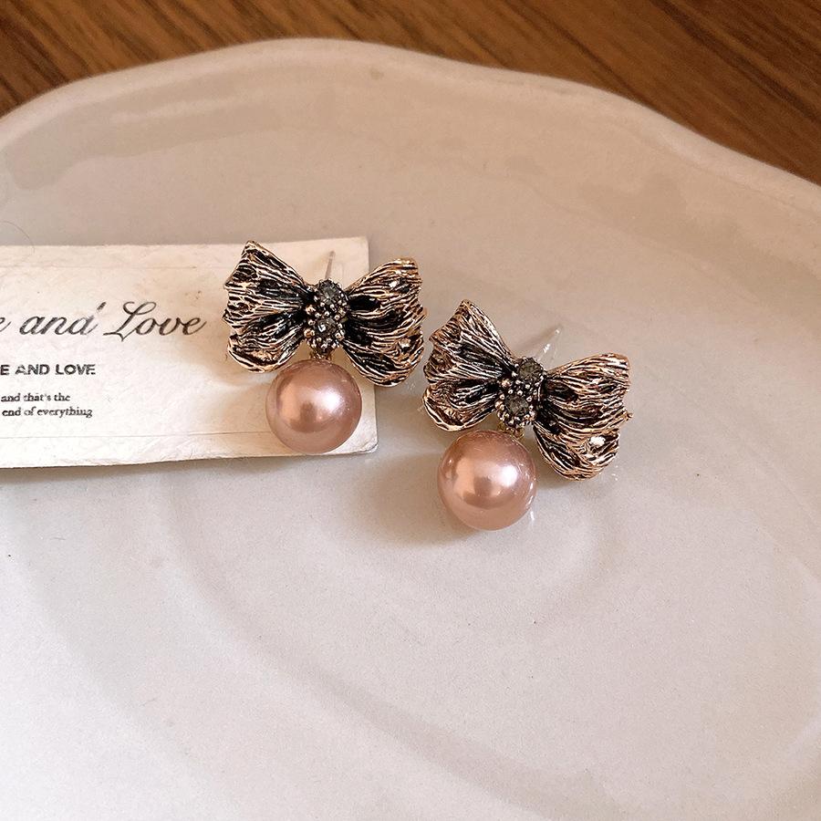 

Silver needle pleated bow pearl pendant earrings light luxury high-end stud earrings retro fashion temperament earrings