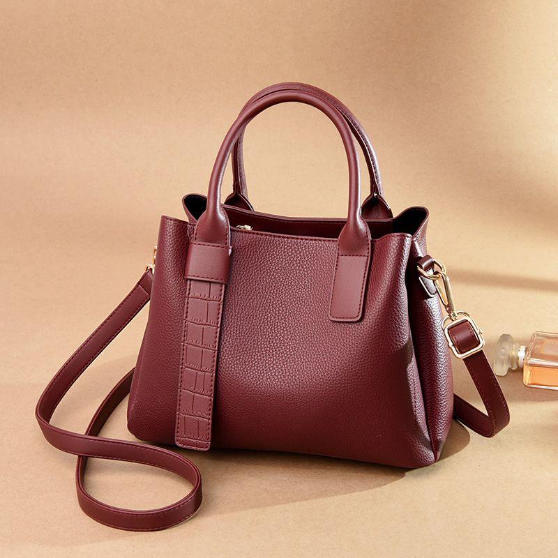 

Stylish Genuine Leather Middle-Aged Ladieswear Women s Commuter Hand-Carrying Bag