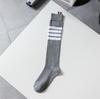AMUSIVE Asymmetrical Striped Spring & Autumn Knee-Length Socks for Women