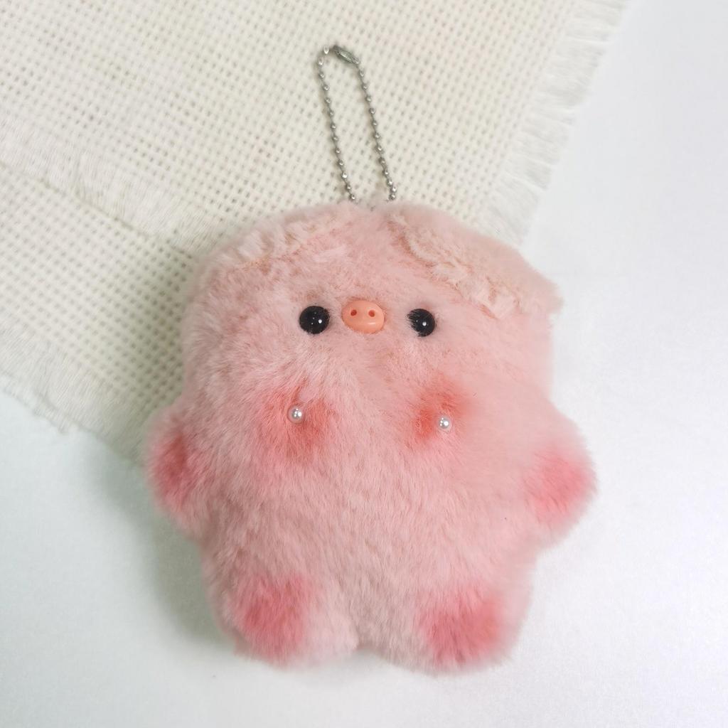 Entzückender Plüschanhänger Schwein und Hase mit Perlenakzenten