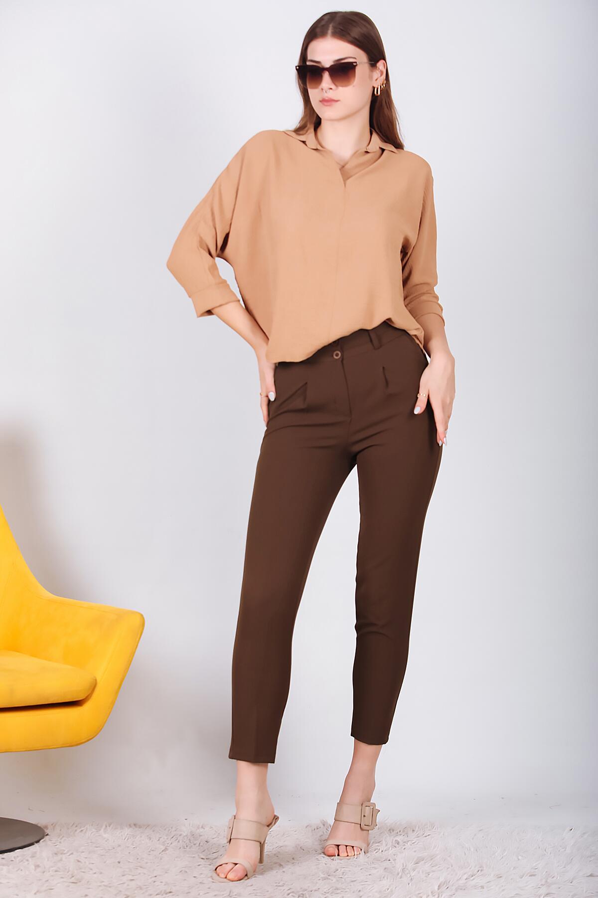 

Женские брюки с двойными пуговицами 38 коричневый