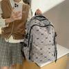 Bow Print Corduroy Backpack Casual Fashion Daily Bag Large Capacity School Bag for Students Minimalist Design Commute Travel with Tassel Accents