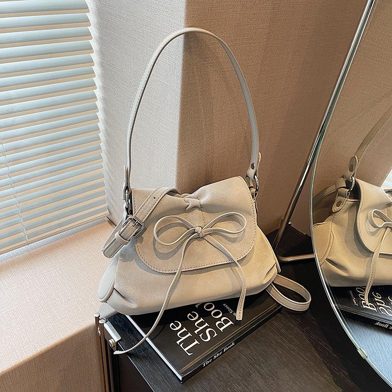 

Solid color trendy personality daily commuting simple shoulder bag messenger bag pleated bow women s bag светло-серый