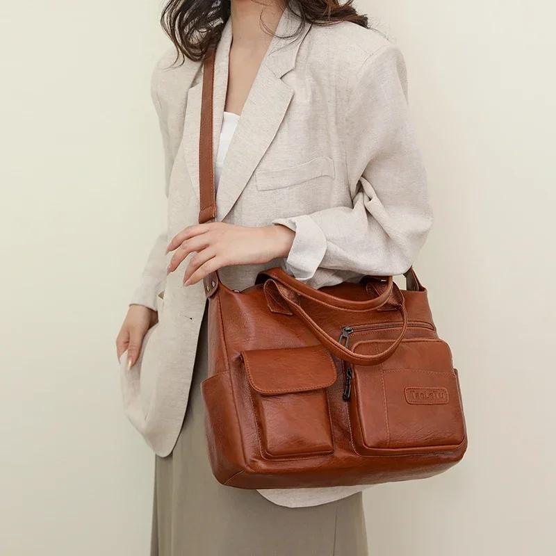 Damen-monochromatische PU-Reißverschlusstaschen elegante Crossbody-Taschen hohe Kapazität lässige Umhängetaschen Nahtlinie neue Marke Mode