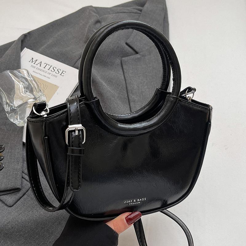 2025 fashion new design casual oil wax leather portable bucket bag simple and versatile solid color temperament messenger women's bag