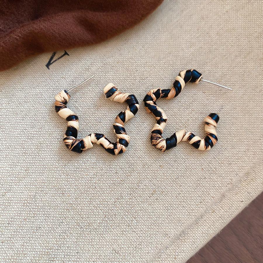 European and American retro autumn and winter geometric leather leopard print earrings light luxury stud earrings personality temperament earrings