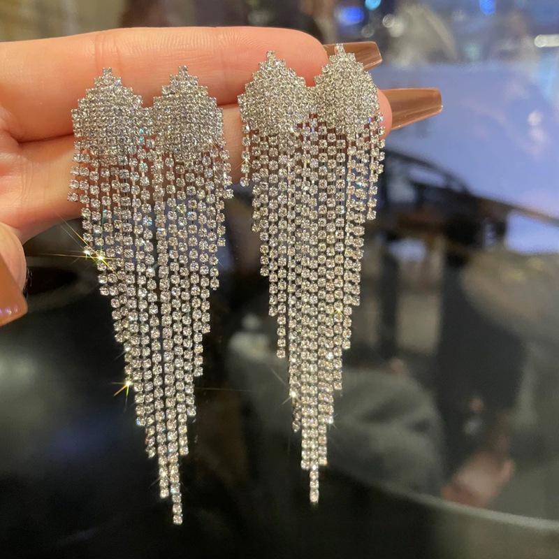 

Шикарные европейские и американские серьги с кисточками - Звездный стиль, Высококлассный и Драматичный дизайн