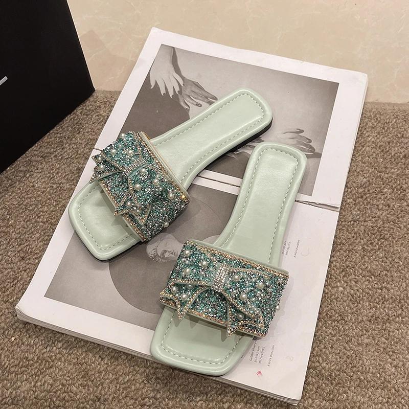Fashion Women Summer Slippers 2025 New Luxury Design Crystal Pearl Bowknot Ladies Fashion Sandals Plus Size Women Flip Flops Flat Shoes