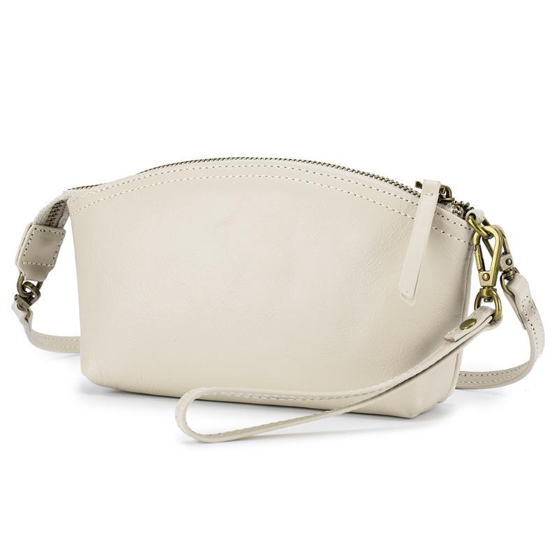 

New leather portable clutch bag vegetable tanned leather multi-functional cosmetic bag first layer cowhide women s messenger bag women s bag грязно-белый