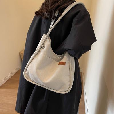 Einfache Nischen-Canvas-Tasche, neue große Retro-Schultertasche für Damen, strukturierte Pendler-Schultertasche für unter den Arm für Damen