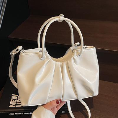 Koreanische Version von fremdem Stil Nischendesign gefaltete Handtasche Tasche Damen vielseitig fremder Stil fortgeschrittener Sinn Ölwachsleder Pendler Messenger Bag