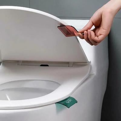 1pc Creative Multicolor Toilet Seat  Lid Handle Lifter Strong Paste Flip Sticker Bathroom Accessories Toilet Lid Lifter Toilet