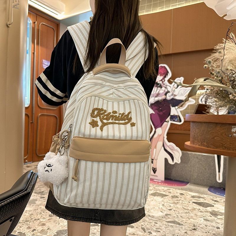 Striped backpack, large-capacity high school backpack, new lightweight schoolbag for junior high school students in the school season