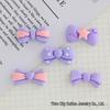 Bowknot Resin Accessories: Vibrant DIY Hair Clips, Phone Case Charms, Fridge Magnets, Crocs Decorations, and Car Adornments.