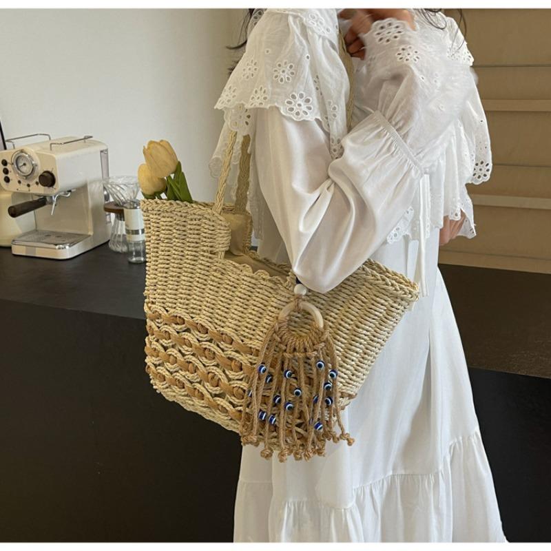 Gewebte Stroh-Umhängetasche Vielseitige große Tragetasche Hohl geflochtene Strohtasche Wellenmuster Sommer-Damentasche