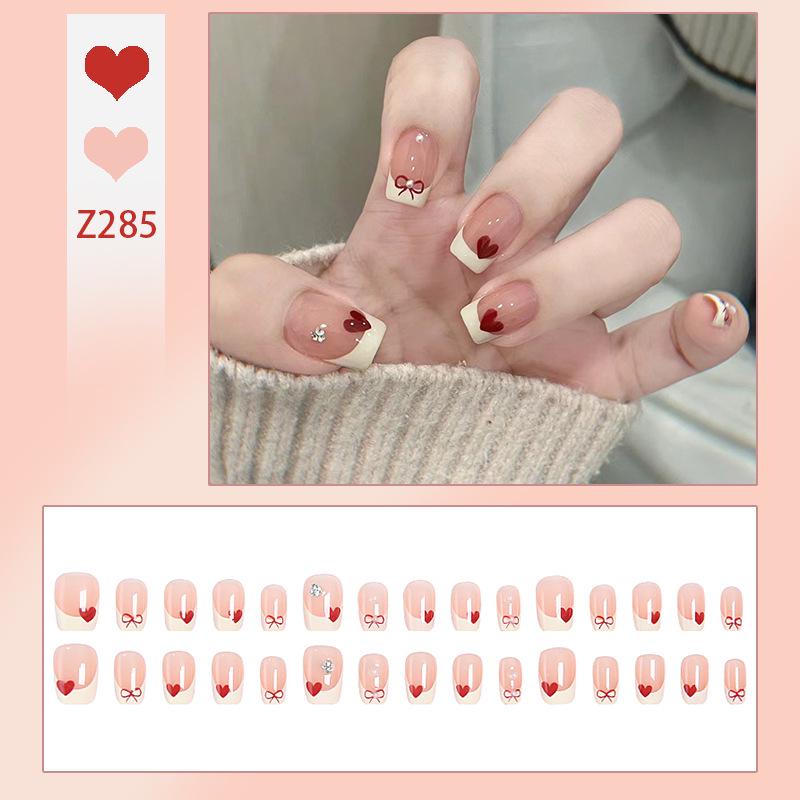 

Love Heart Bow Nail Patches: Short, Summer-ready, Whitening French Manicure with Removable, Wearable White Edge Nail Pieces. Glue Version
