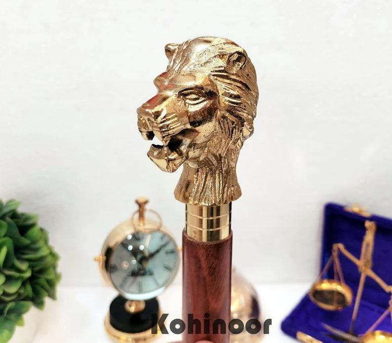 

Engraved Lion Head Walking Stick: Golden Brass Finish, 39 Inch Cane золотой