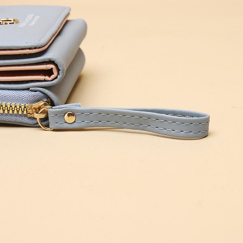 Dámská třískládací peněženka v korejském stylu pro rok 2025 se zipovou kapsou na mince a kresleným designem