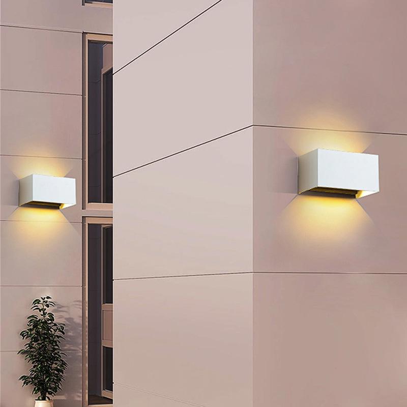 LED Outdoor Four-Leaf Clover Wall Light - Up and Down Beam Decoration for Garden and Exterior Walls.