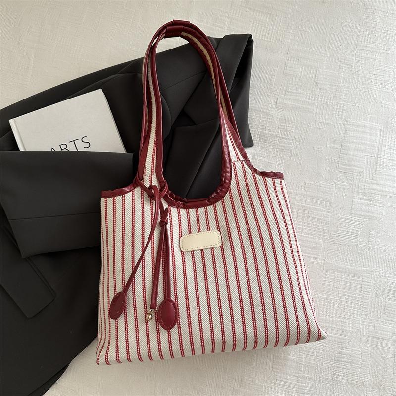Large capacity tote bag women's new versatile canvas striped commuter shoulder bag women's casual armpit bag