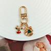 Festive Christmas Keychain: Metal Tree, Snowman & Santa Bag Charm – Stylish Small Gift