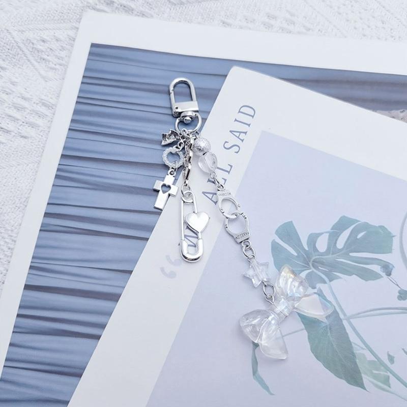 Modische Schleife Schlüsselanhänger Süß Cool Kreuz Perlen Schlüsselanhänger für Damen Tasche Schmuck