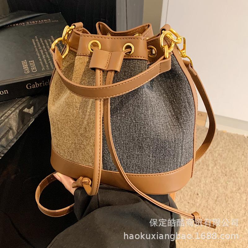 New bag women's 2025 popular bucket bag autumn and winter niche design messenger bag high-end sense work small bag