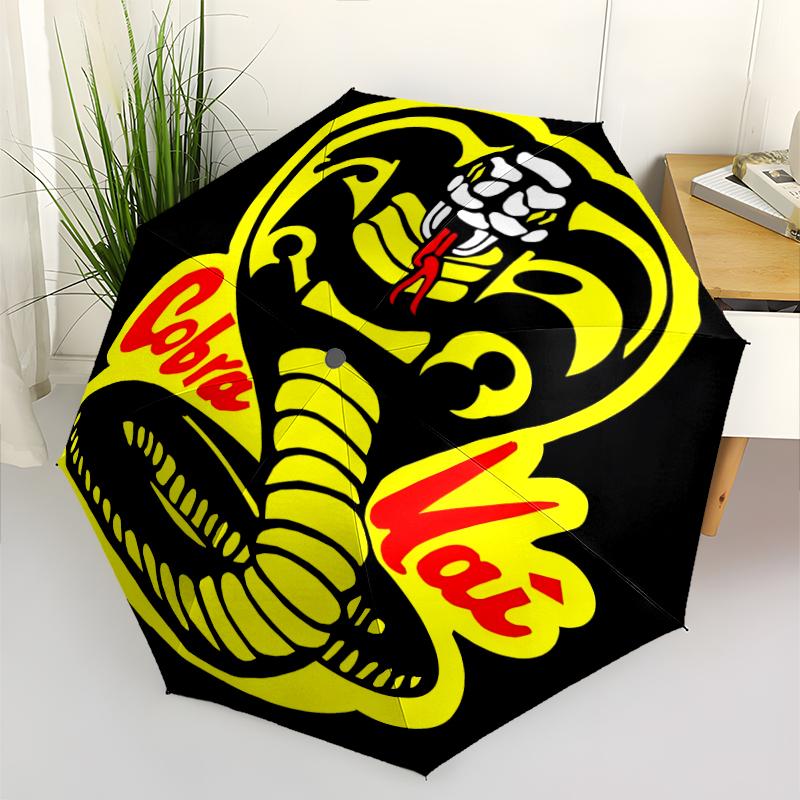 Cobra Kai Fashionable Automatic Opening/Closing Folding Umbrella. Portable and Foldable, Ideal for Gift, Travel, and Daily Use.