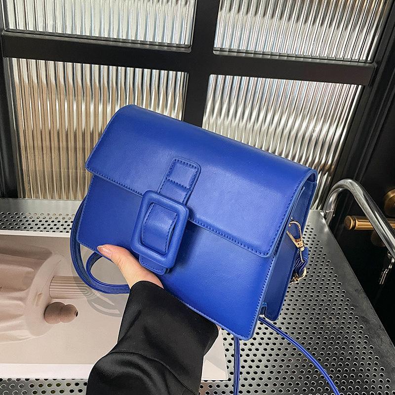 

This year s popular fashion Korean version temperament commuting solid color foreign style small bag women 2025 summer new small square bag tide синий