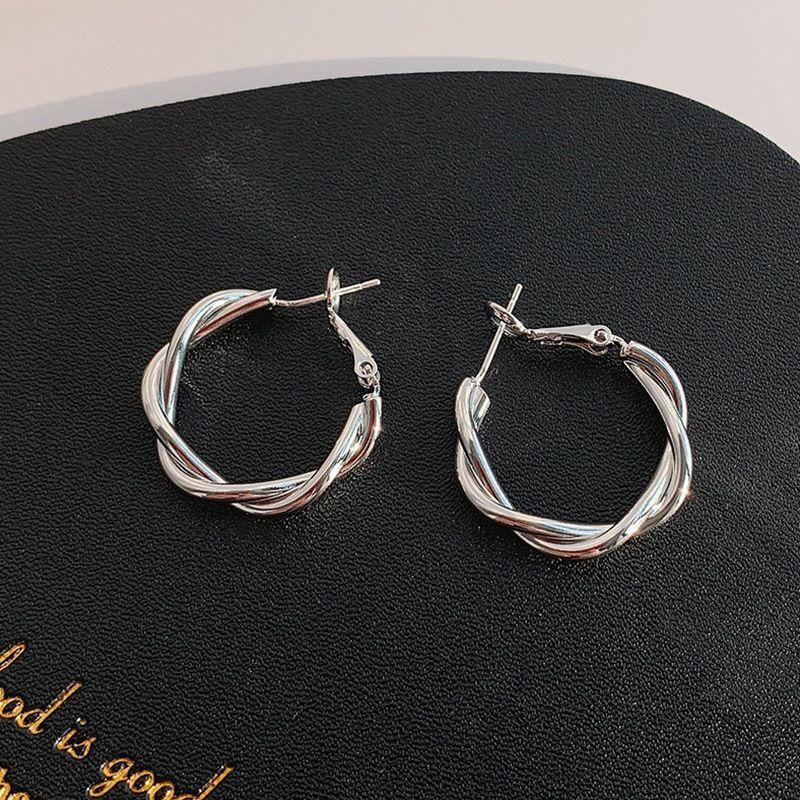 111 Silver needle twist curved twist earrings, simple geometric earrings Internet celebrity earrings