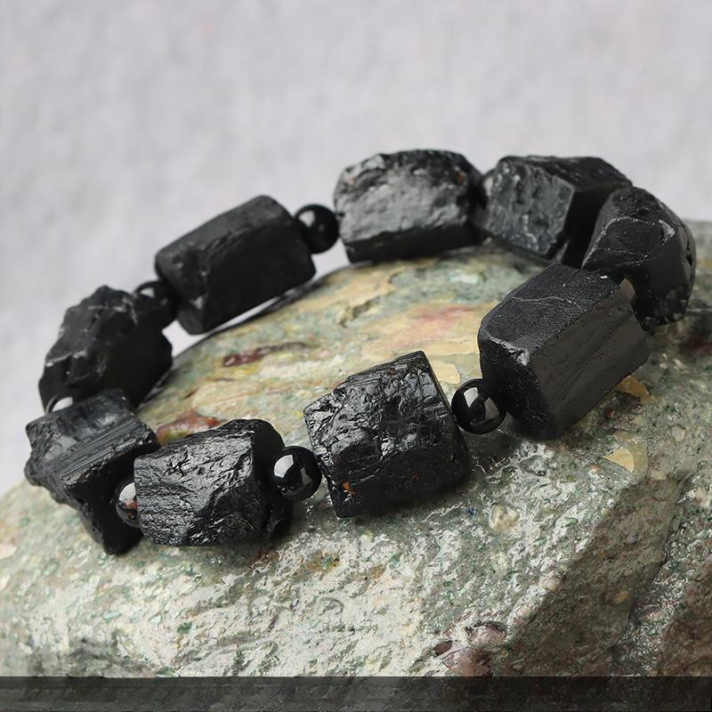 

Браслет из натурального черного турмалина | Защита энергией необработанного кристалла | Щит от ЭМП-излучения | Заземляющий целебный камень | Украшение для балансировки чакр Length: 15mm Width: 13mm