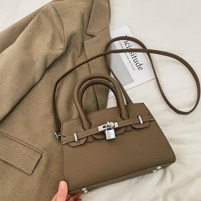 Bag women's new trendy high-end fashion niche design shoulder messenger bag portable platinum bag