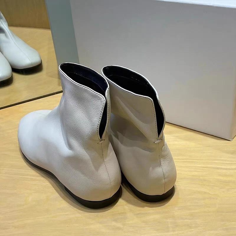 Korean version of the rear V-port niche design flat-bottomed white small short boots square Martin boots women's autumn and winter Chelsea boots