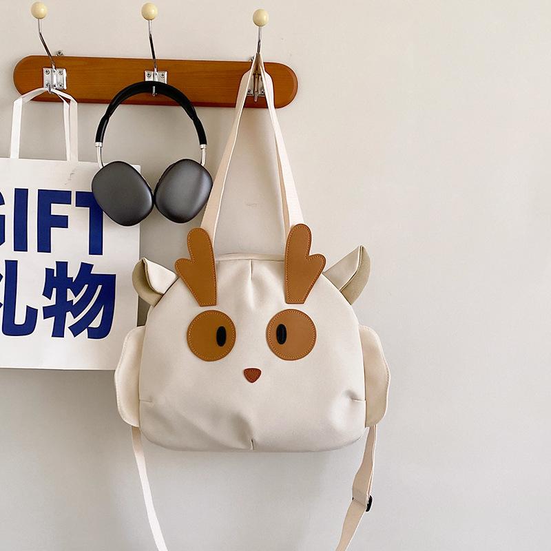 bag shoulder bag cartoon messenger bag middle school student casual canvas large capacity schoolbag cute wind commuter bag