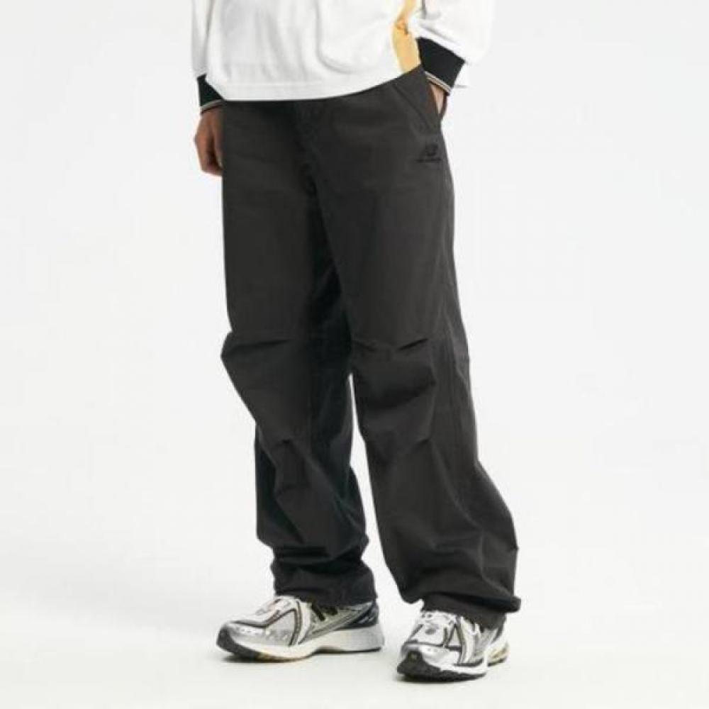 

New Balance Uni Wide Parachute Pants Nbntd32713 17 dark gray/85