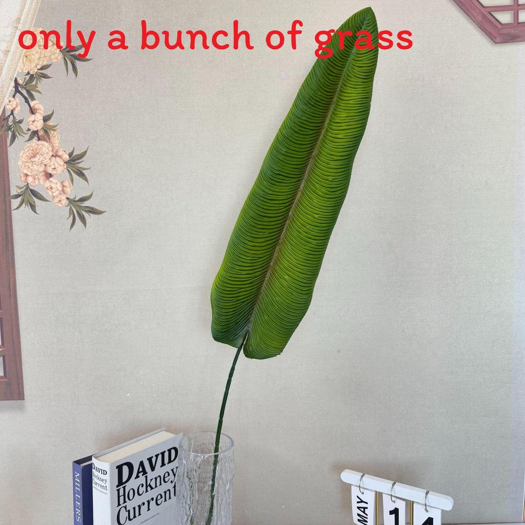 Dekoration i form av en falsk bananbladsfläkt för bröllop och heminredning